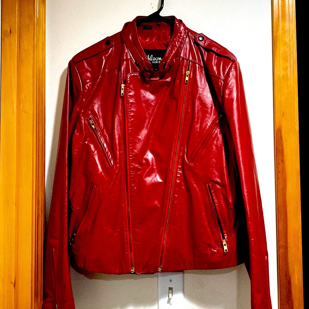 Red leather jacket with lots of zippers nice quality no rips or tears MJ style